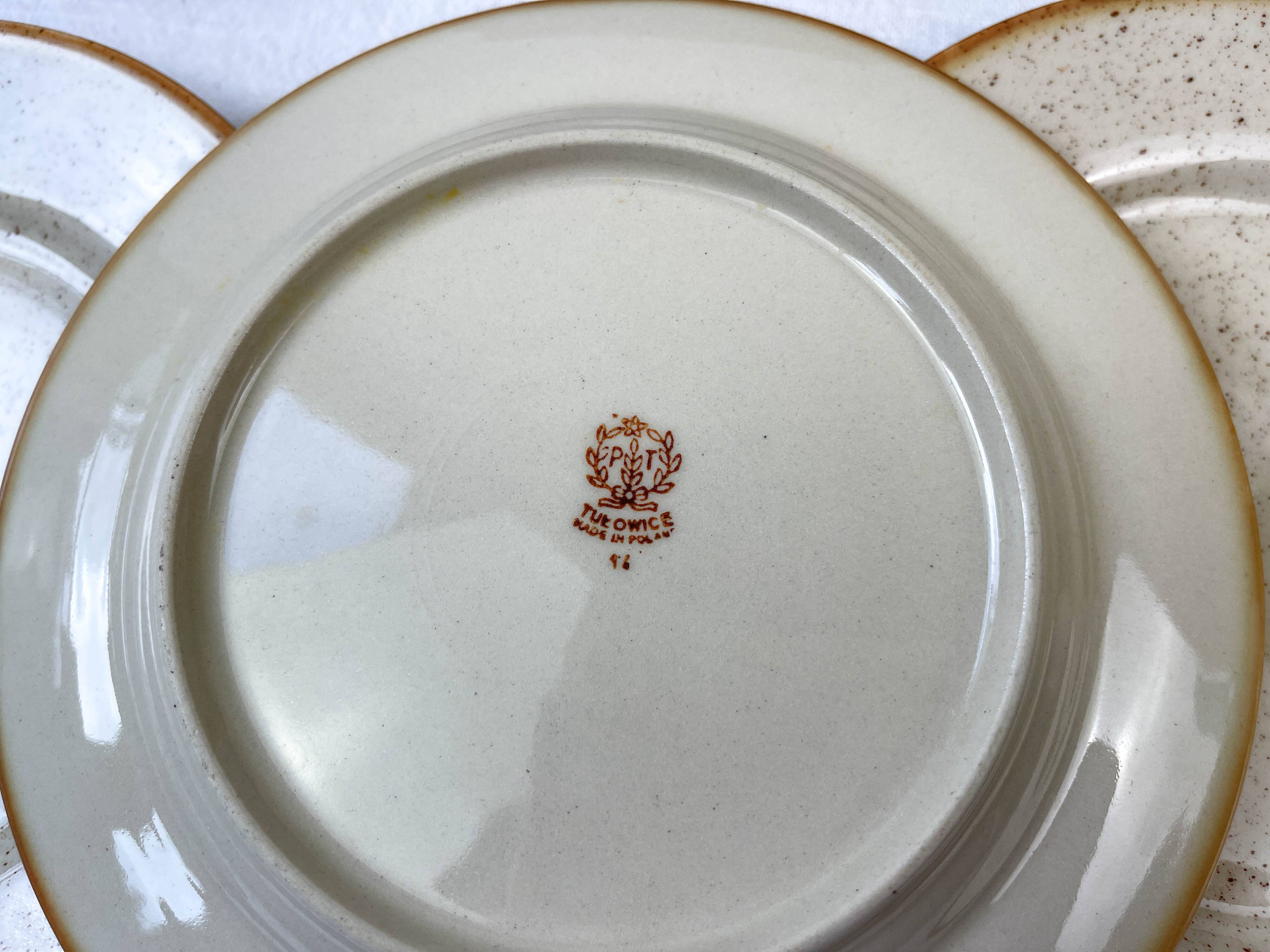 8 Small plates in speckled stoneware Tulowice mid century 20th