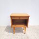 Vintage bedside table from the 60s/70s in wood.
