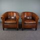 Set of 2 club chairs in black piping sheep leather