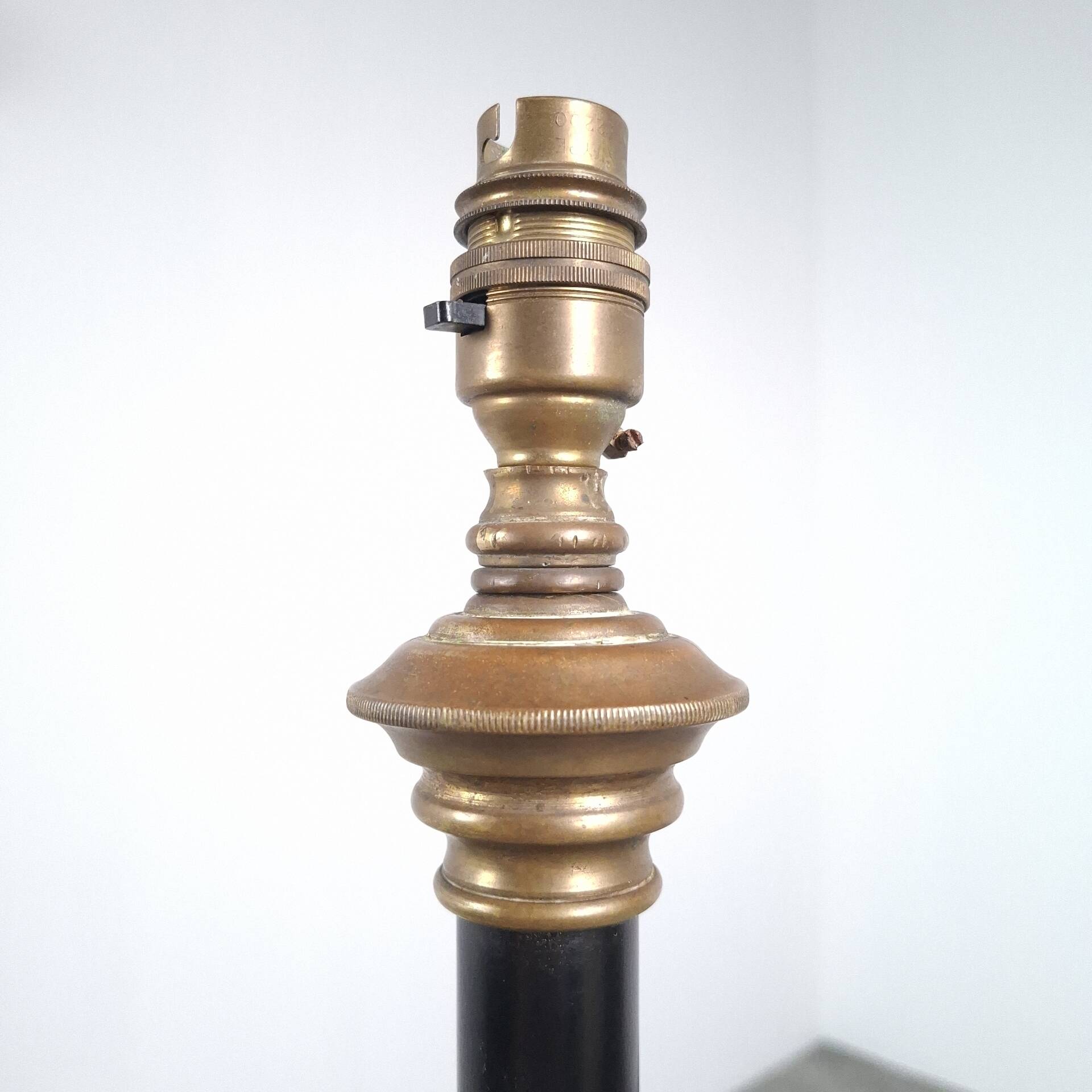 Art and Craft tripod floor lamp in bronze.