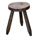 Old dark wood tripod stool