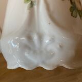 Old ceramic pitcher decorated with flowers