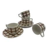 Set of cups with tea towel pattern