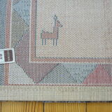Pair of 60 x 120 Peruvian wool rugs
