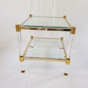 Table basse en lucite et acier doré