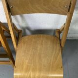 Pair of mismatched wooden folding chairs