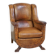 Fauteuil en cuir de mouton antique caractéristique avec de beaux détails et un design unique