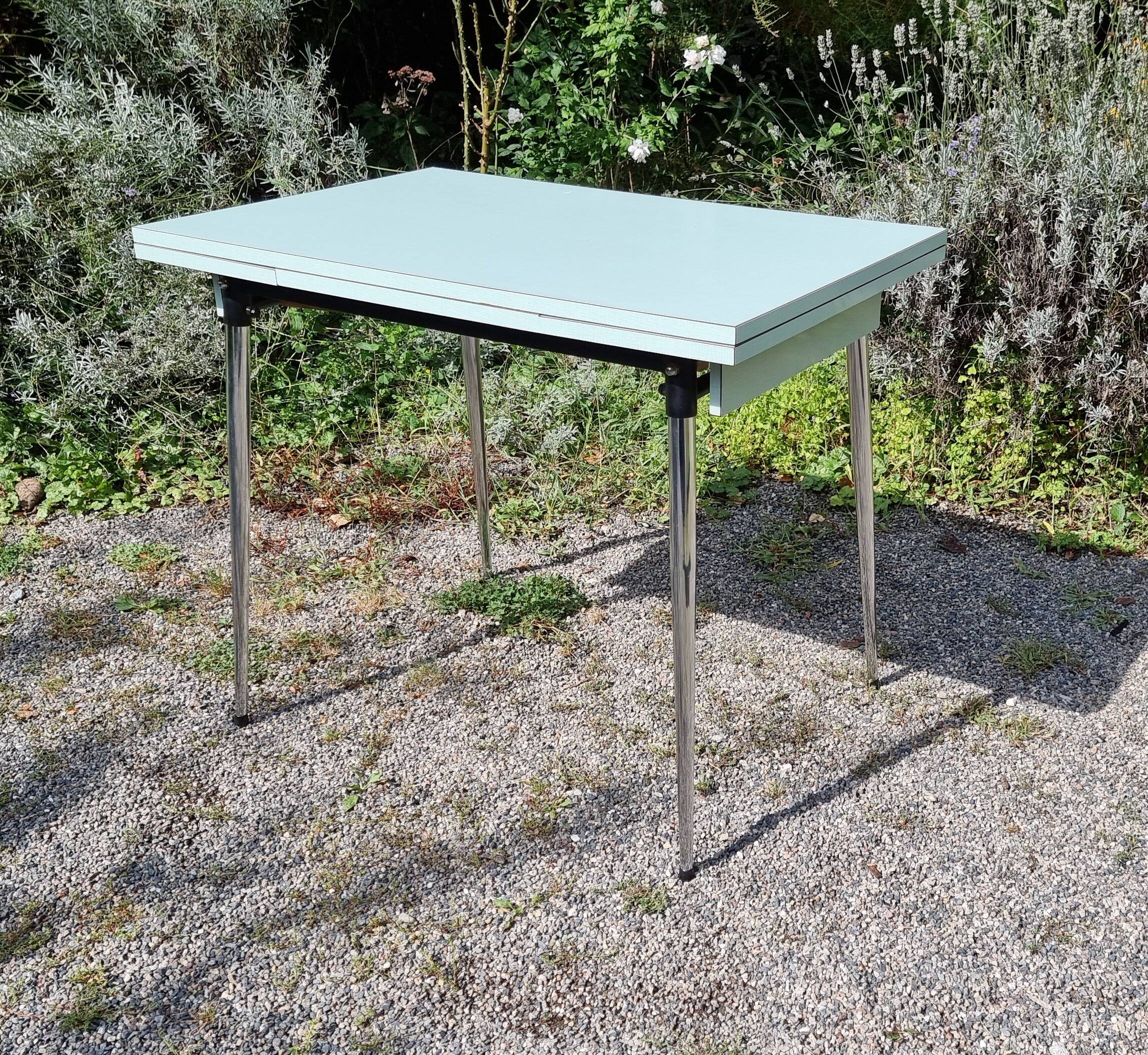 Water green formica table with 2 drawers and extensions