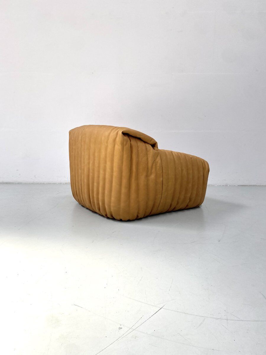 Sandra chair in camel leather by Annie Hiéronimus for Cinna/Ligne Roset.