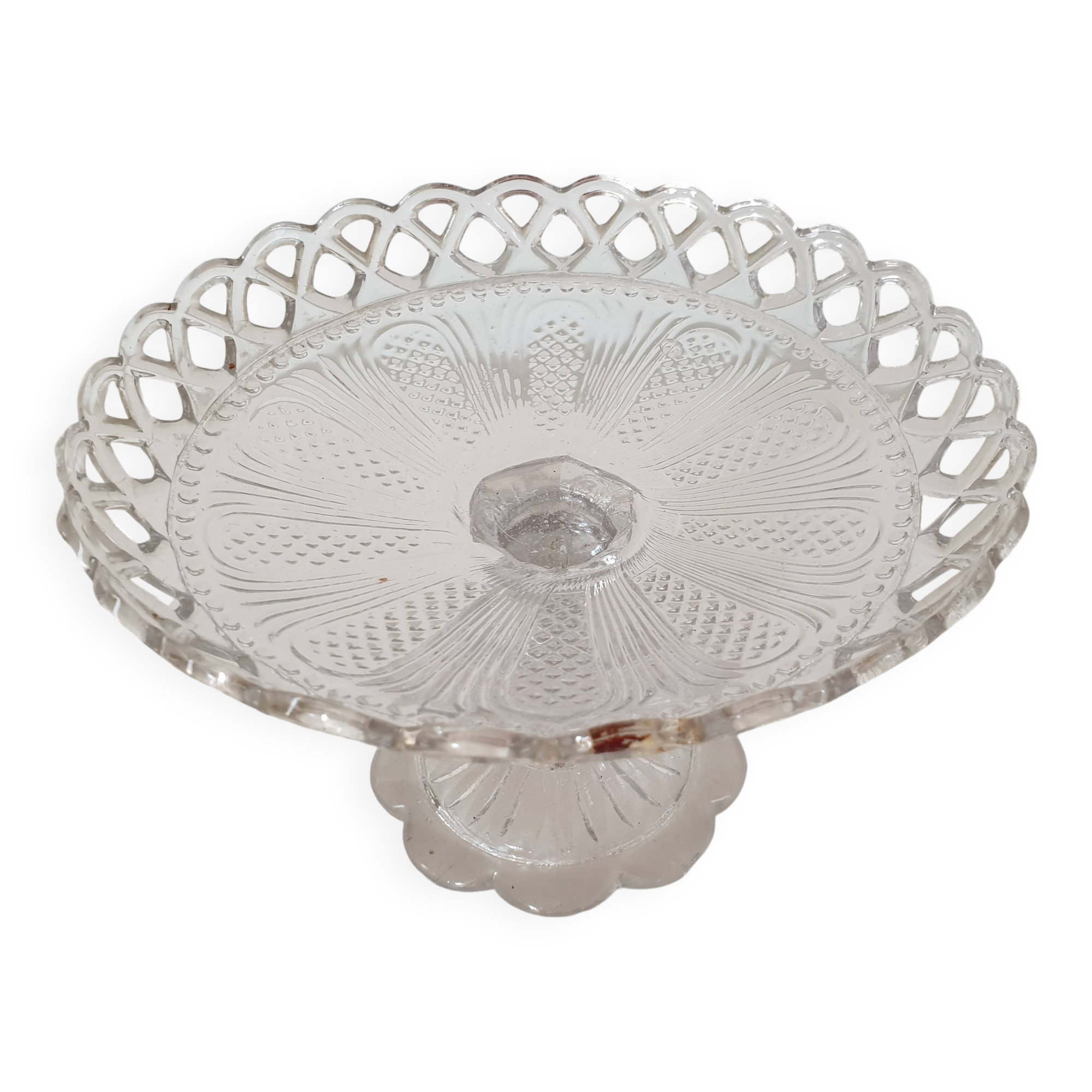Old cup in molded glass colorless decorative table mignardises