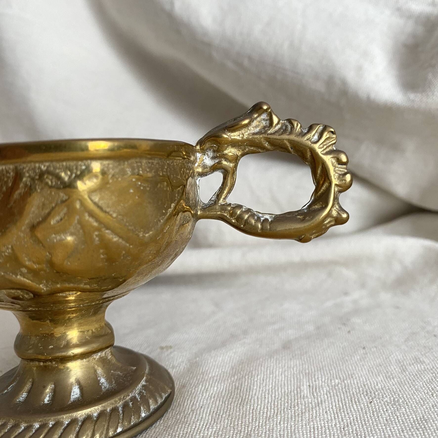 Antique embossed brass ashtray