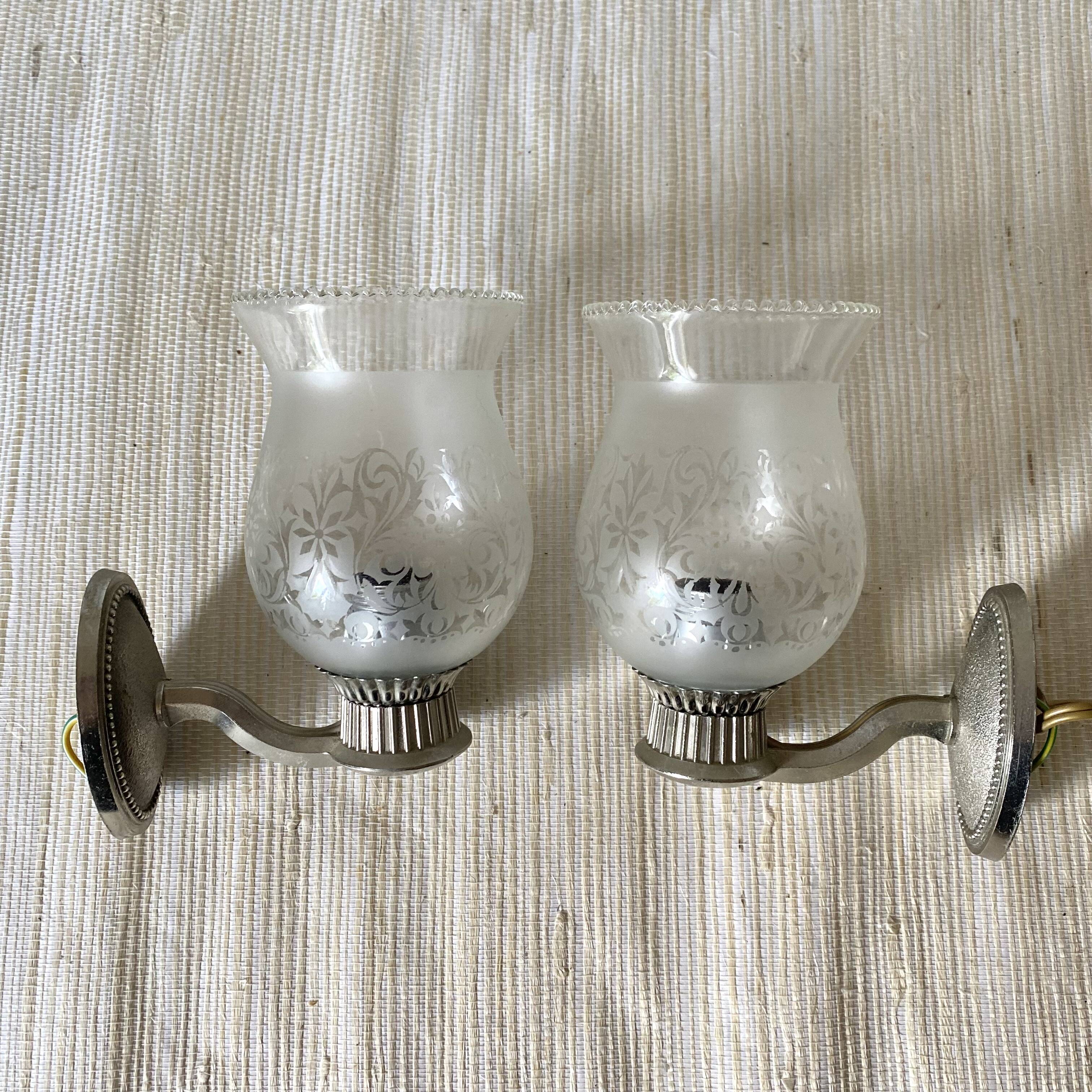 Pair of metal and glass wall lights