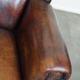 Large Sheepskin Leather Wingback Armchair with a Fixed Seat Cushion and a Stunning Patina