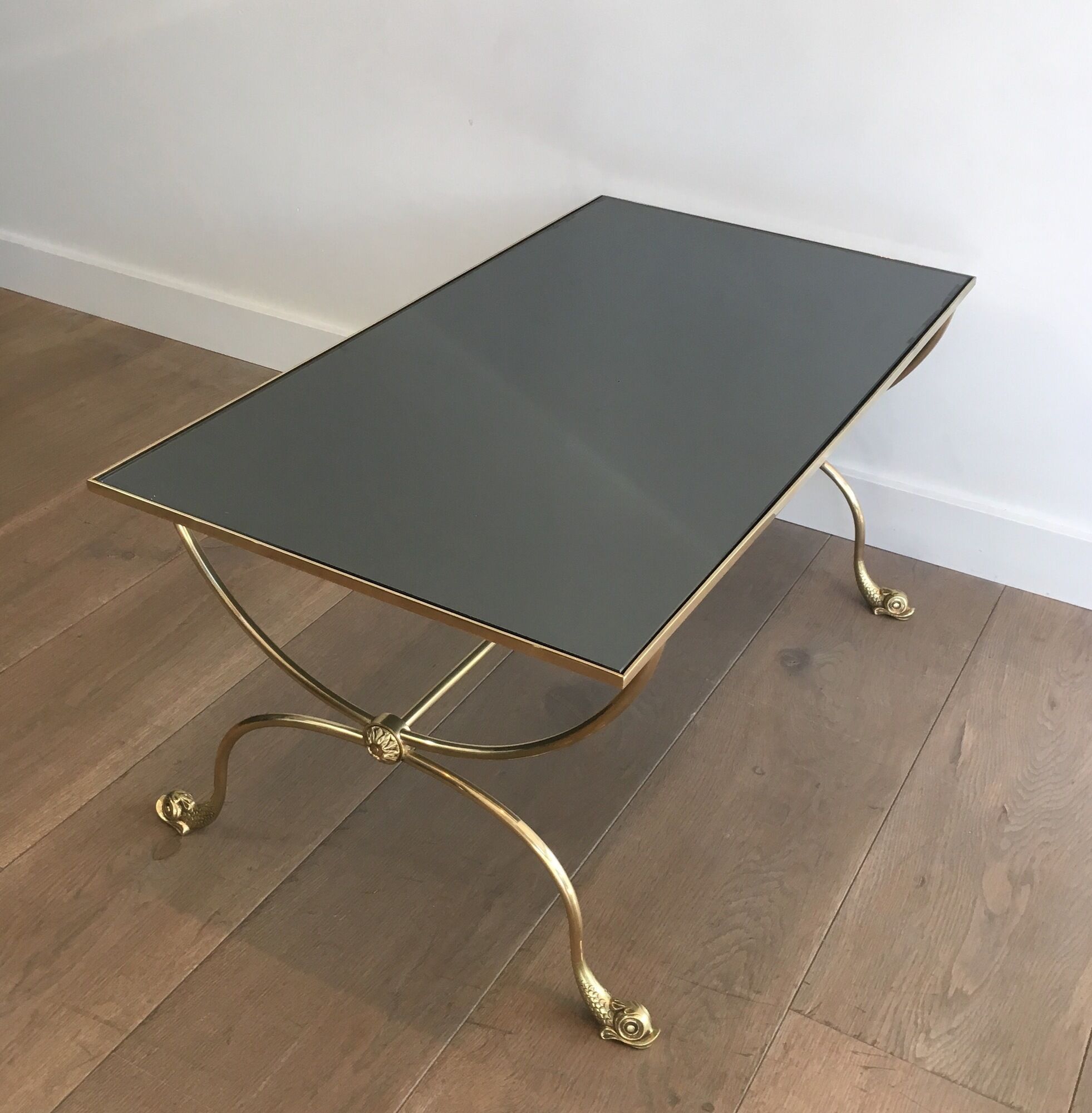 Neoclassical brass style coffee table with dolphin head decoration