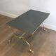 Neoclassical brass style coffee table with dolphin head decoration
