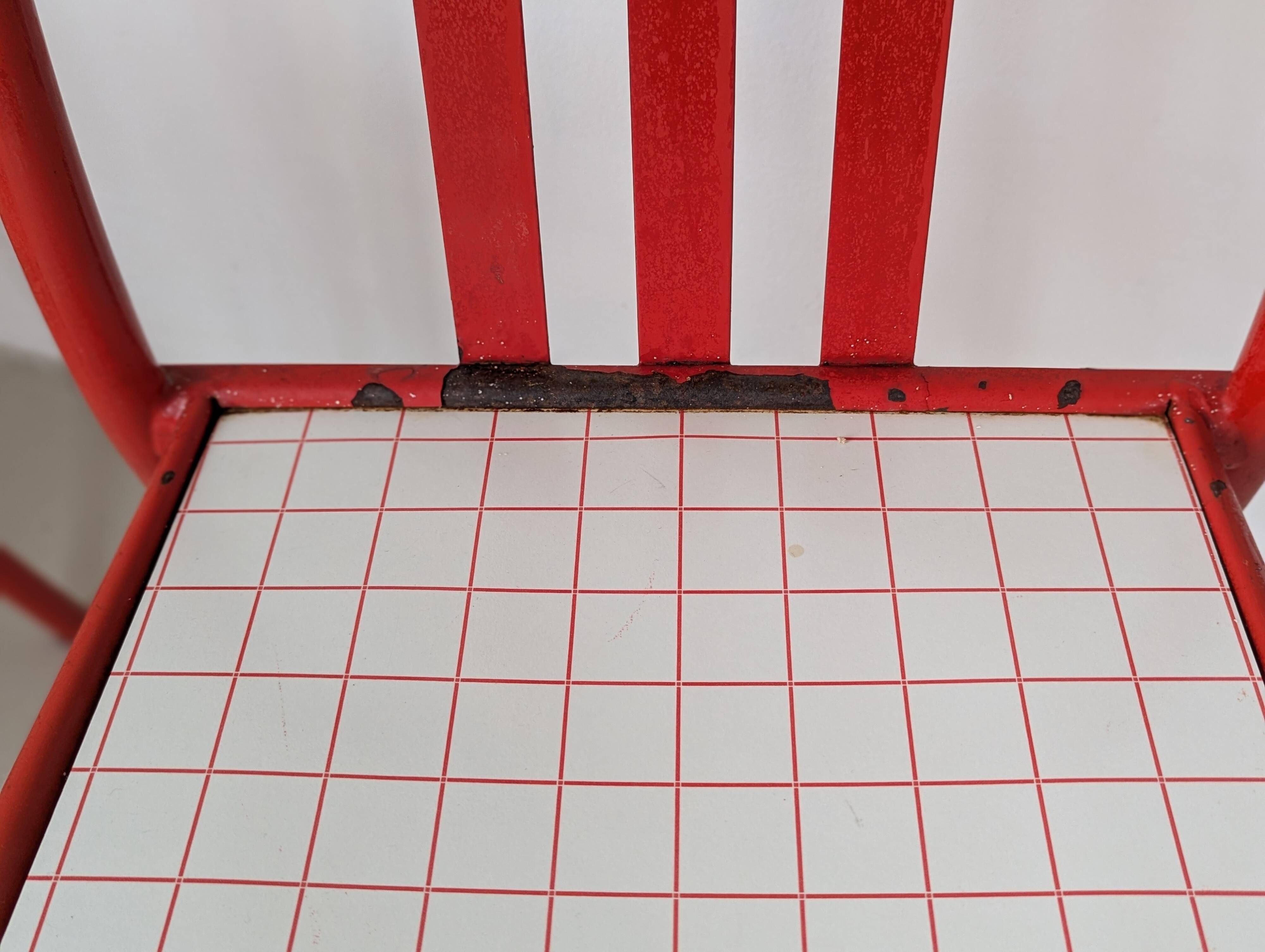 Set of 4 modernist red metal chairs