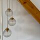 Suspension cascade three lights vintage globes in molded glass