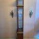 Walnut showcase, grooved uprights, 4 glass shelves