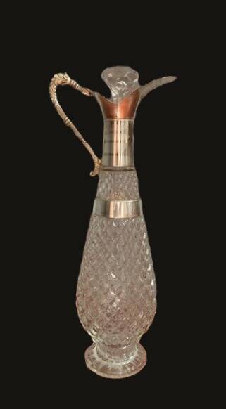 Diamond-point molded glass ewer, silver-plated metal.