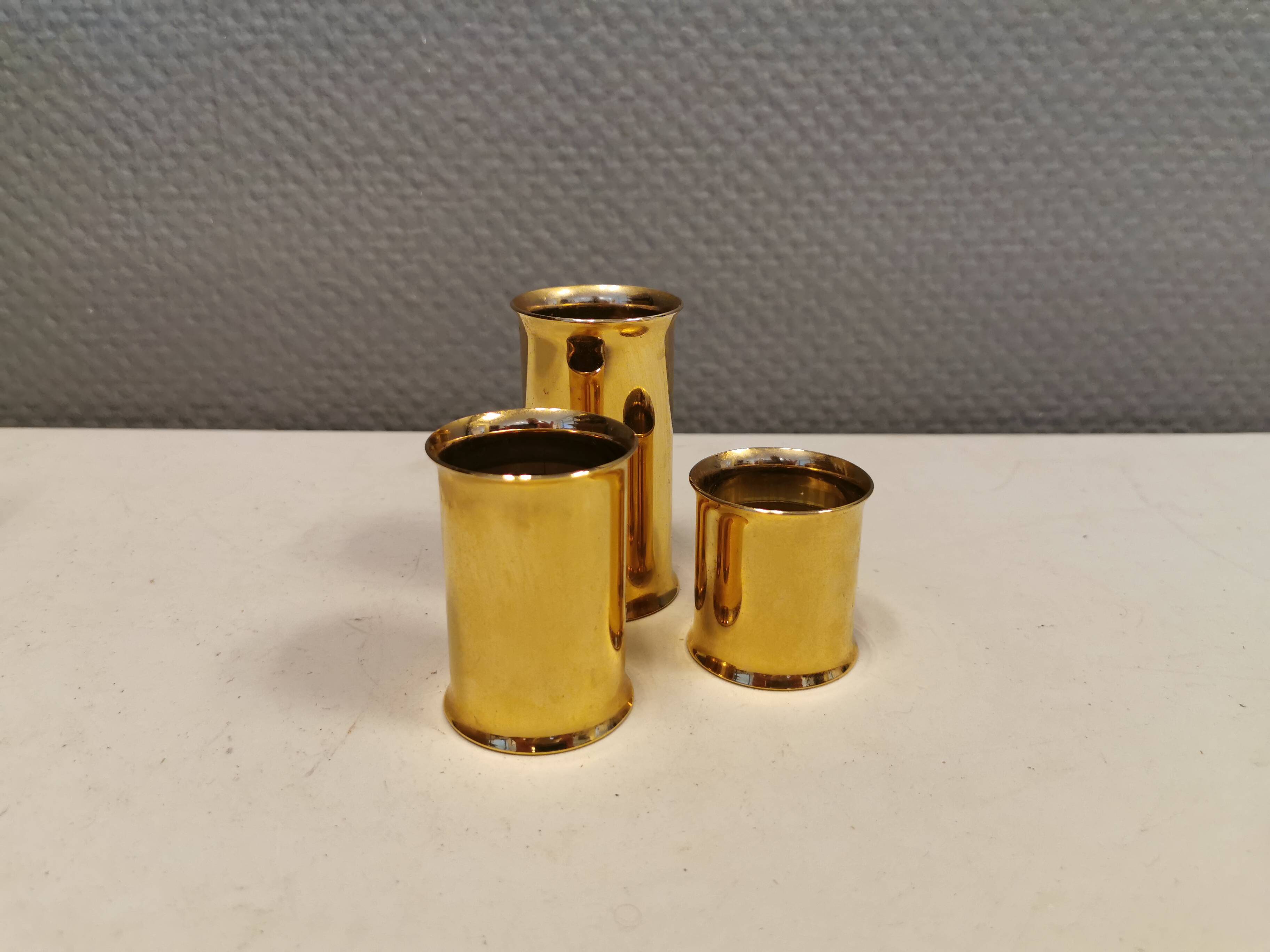 3 beautiful candle holders in 24 carat gold plating.  From Danish Altecco.
