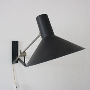 1960s Model “7105” wall lamp by J.J.M. Hoogervorst for Anvia, Netherlands