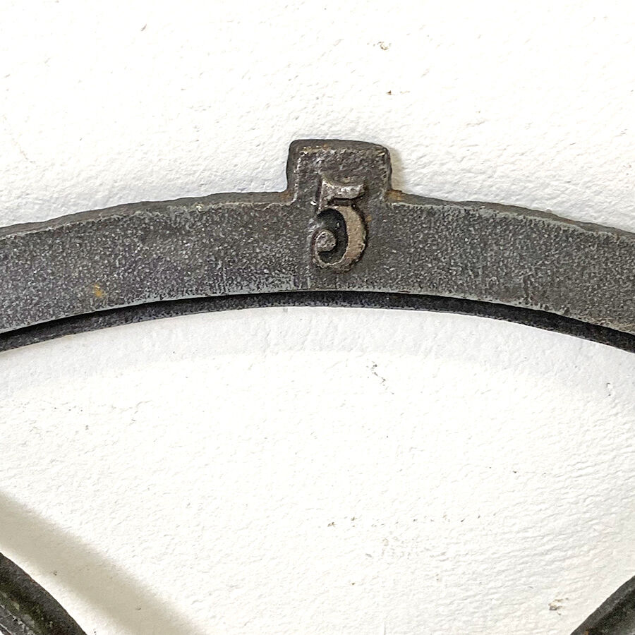 Old arched anthracite grey window