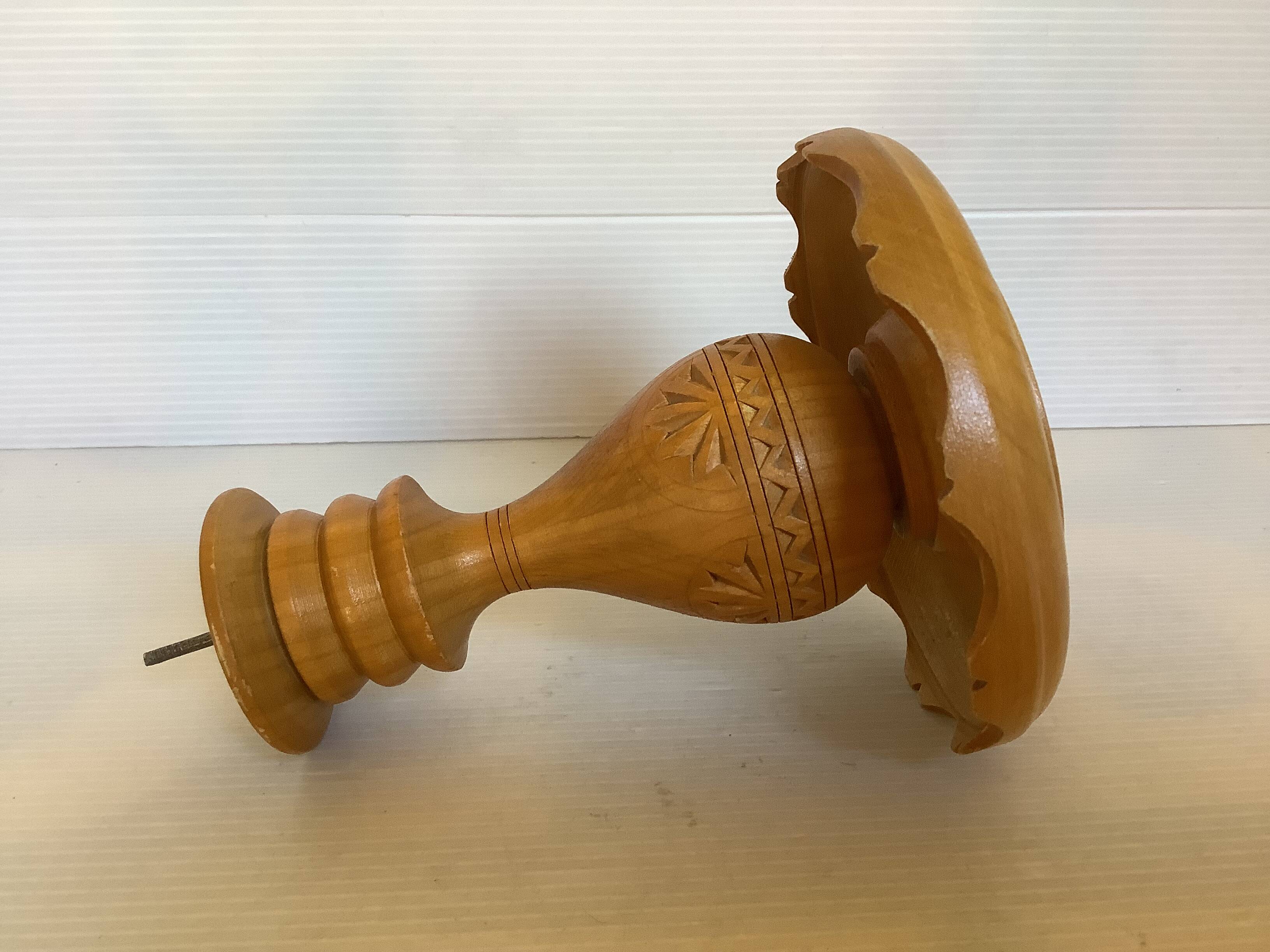 Carved wooden candle holder