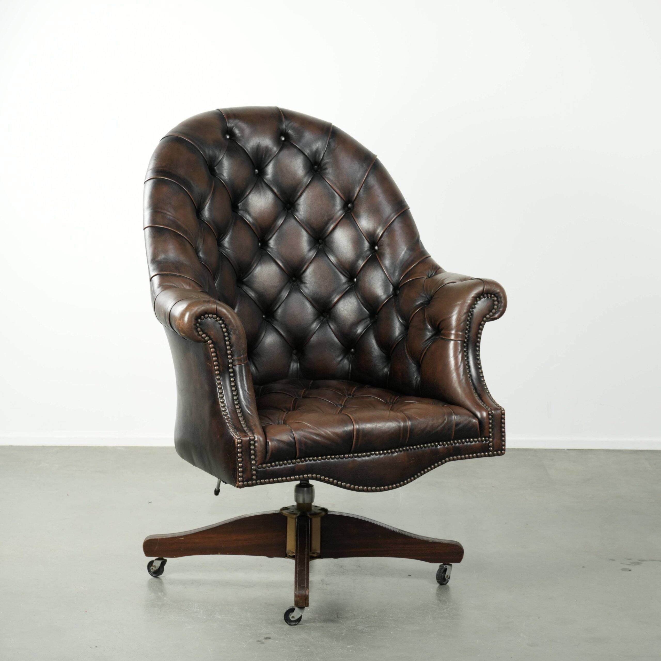 Vintage Chesterfield office chair with decorative nails in English style