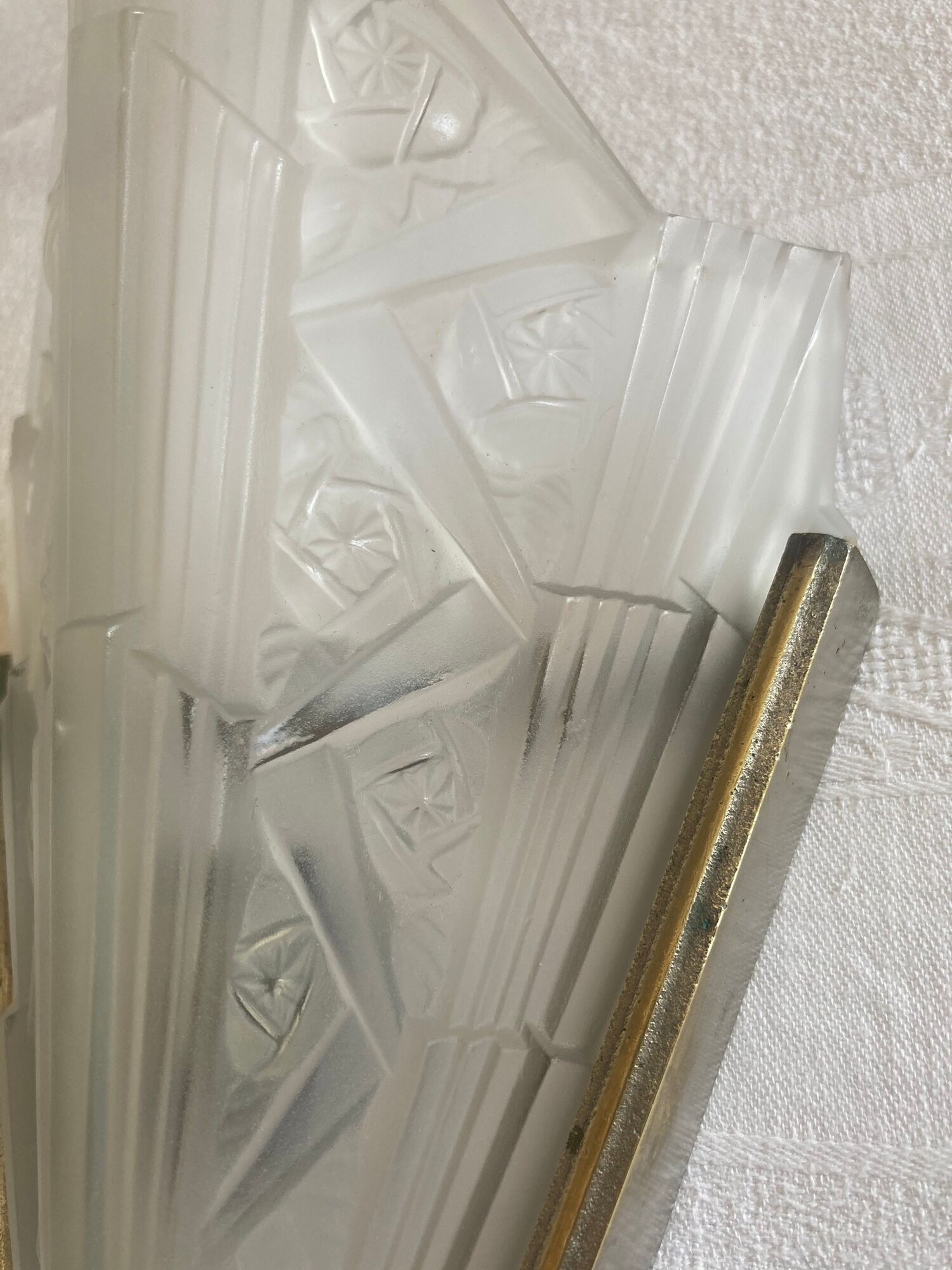 Pair of art deco metal and satin pressed glass sconces