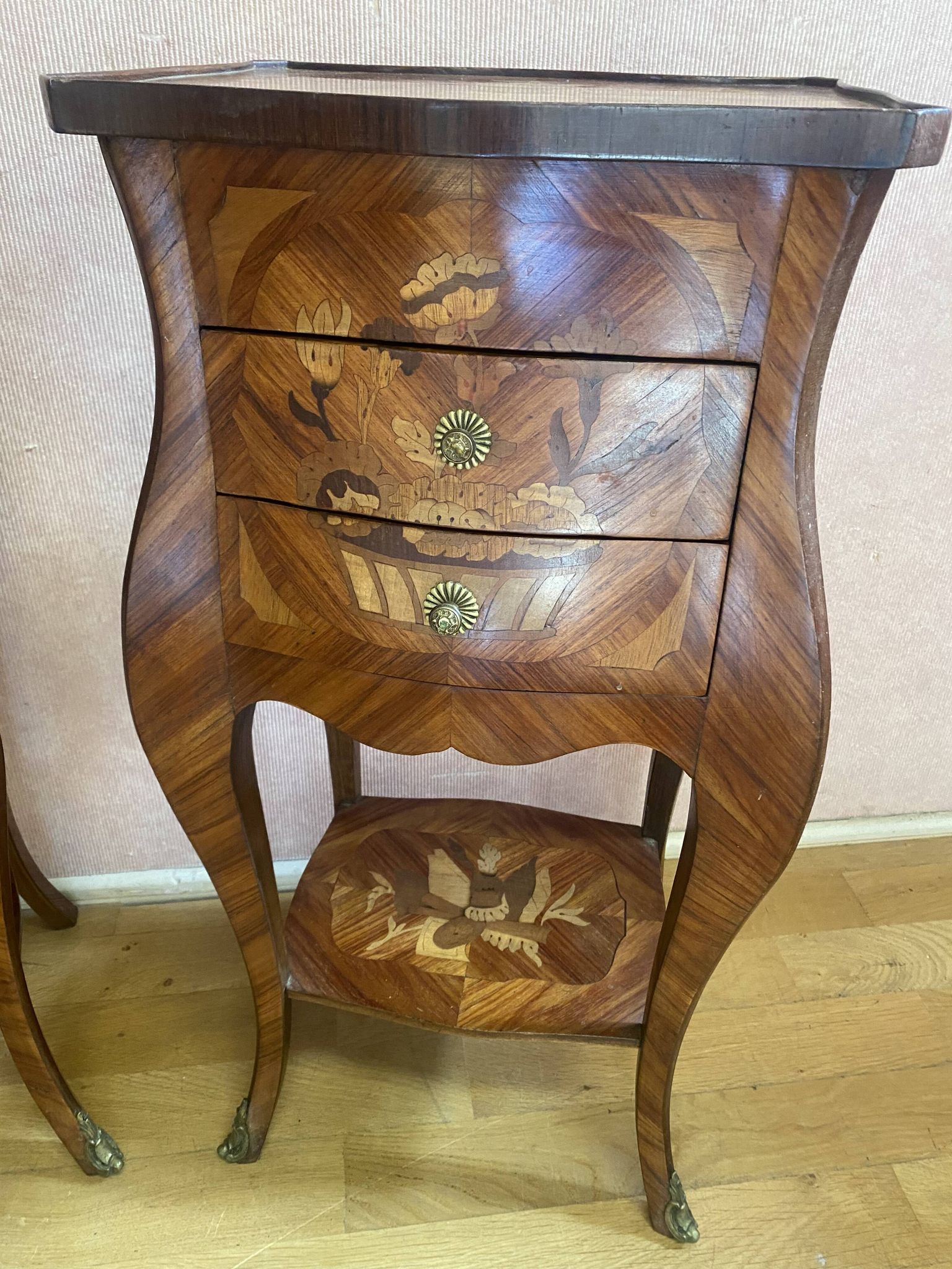 Pair of bedside tables in rosewood veneer on all sides. Louis XV style