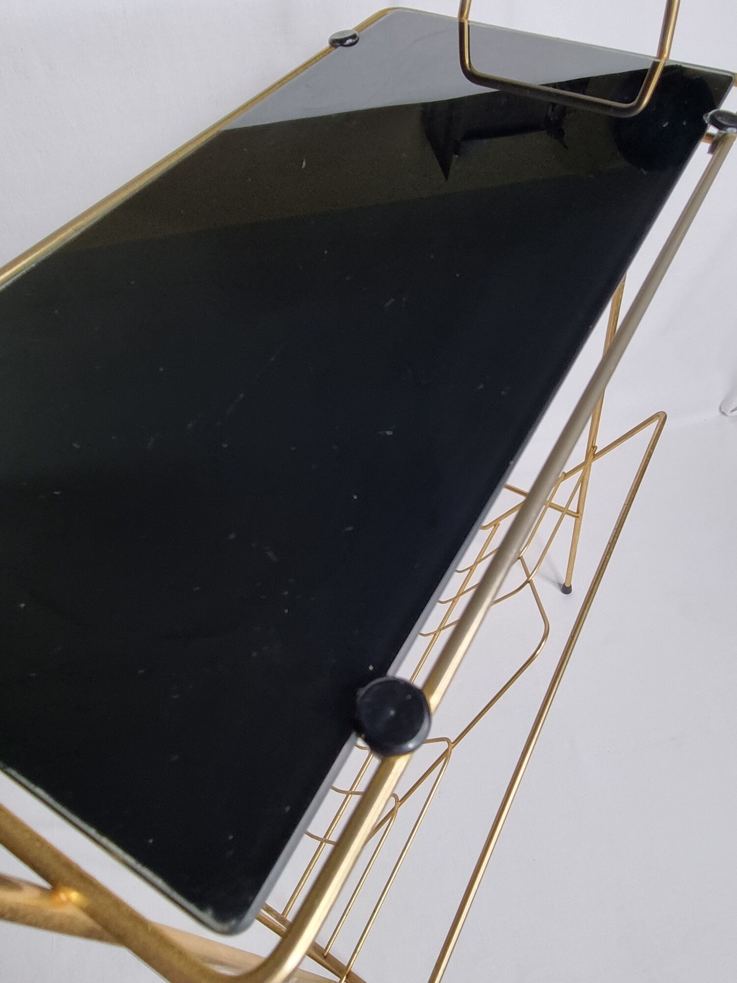 Vintage magazine shelf in glass and gilded metal