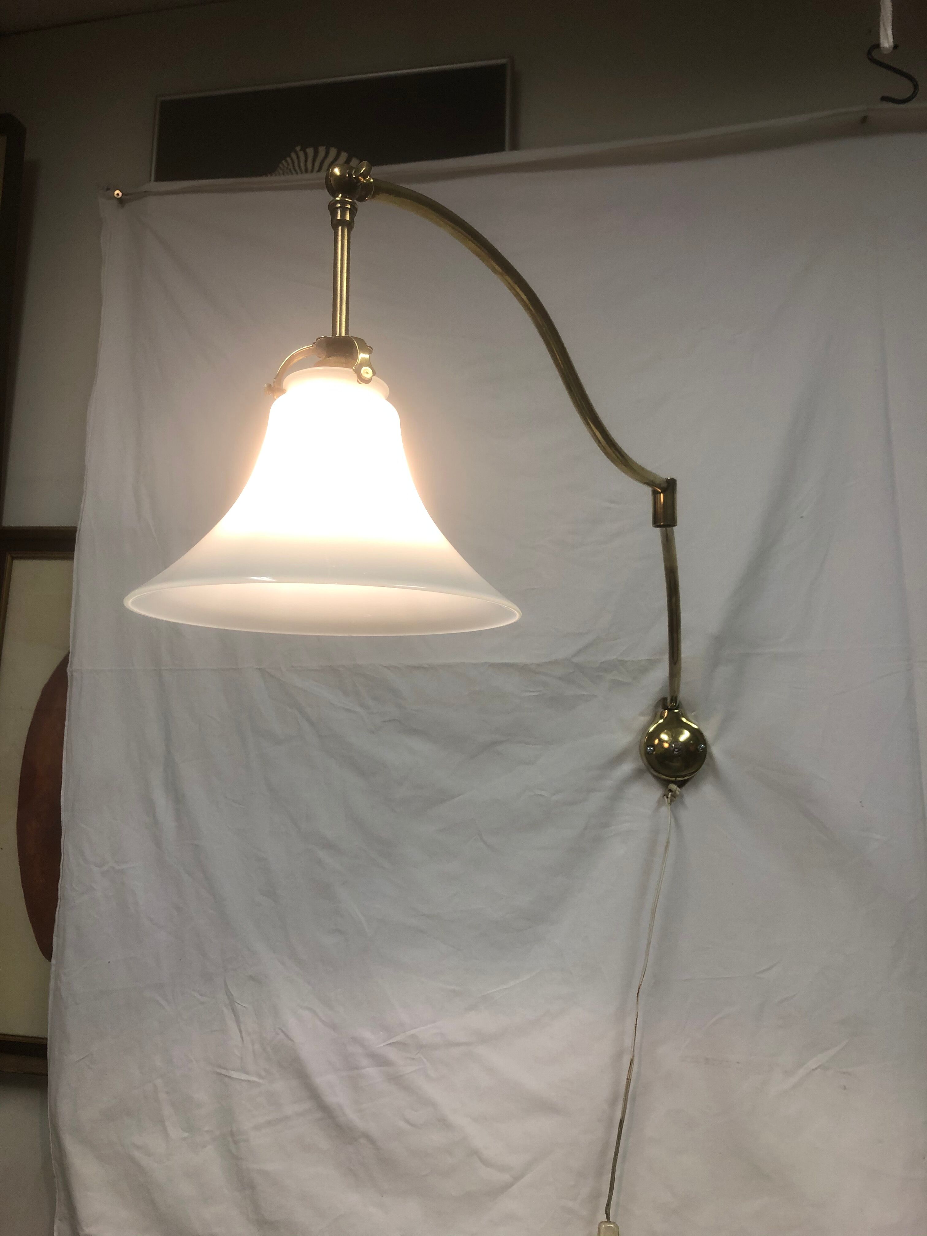 Articulated brass sconce 1950