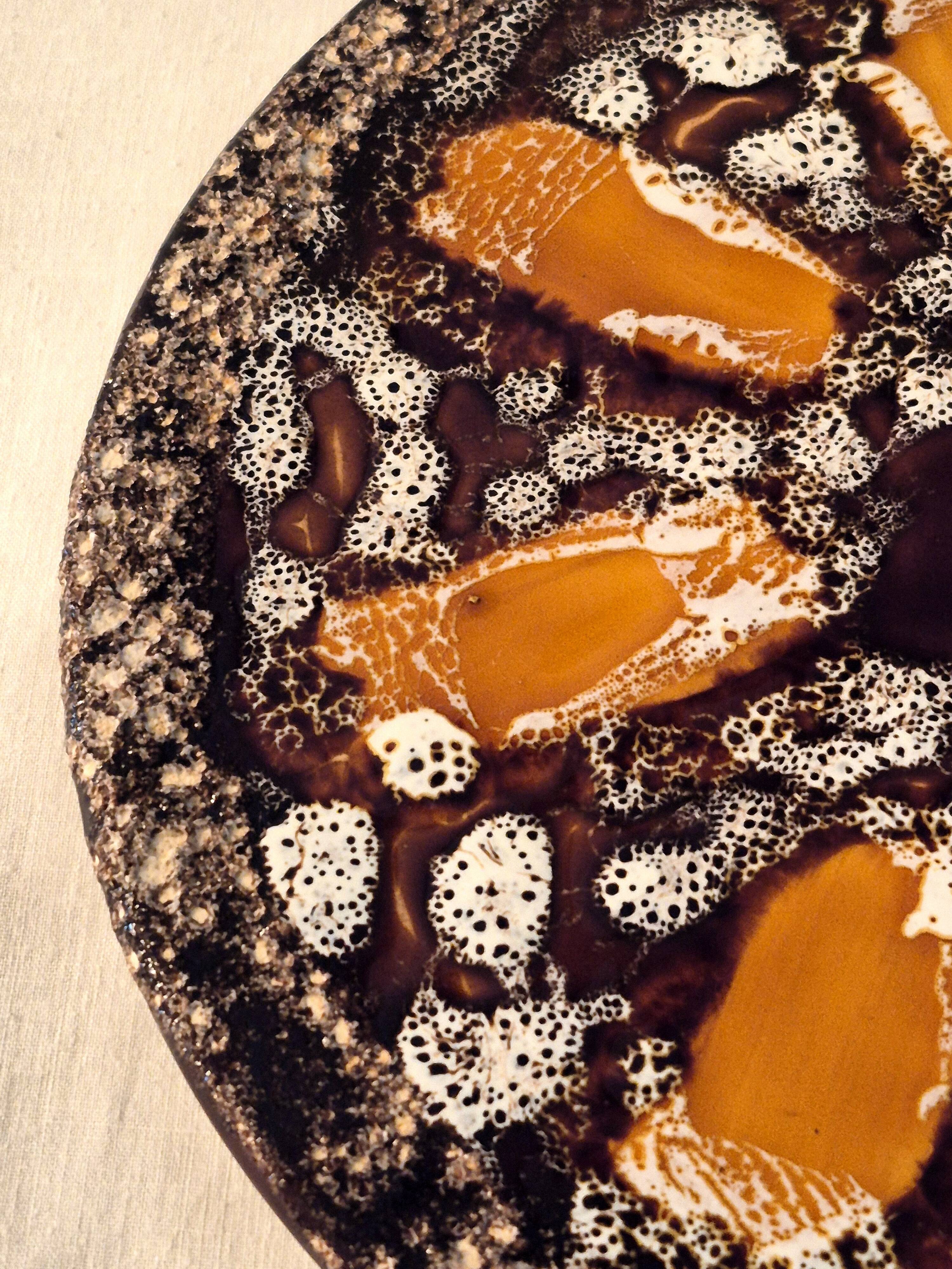 Round plate Vallauris glazed ceramic in brown and orange and Fat Lava A036