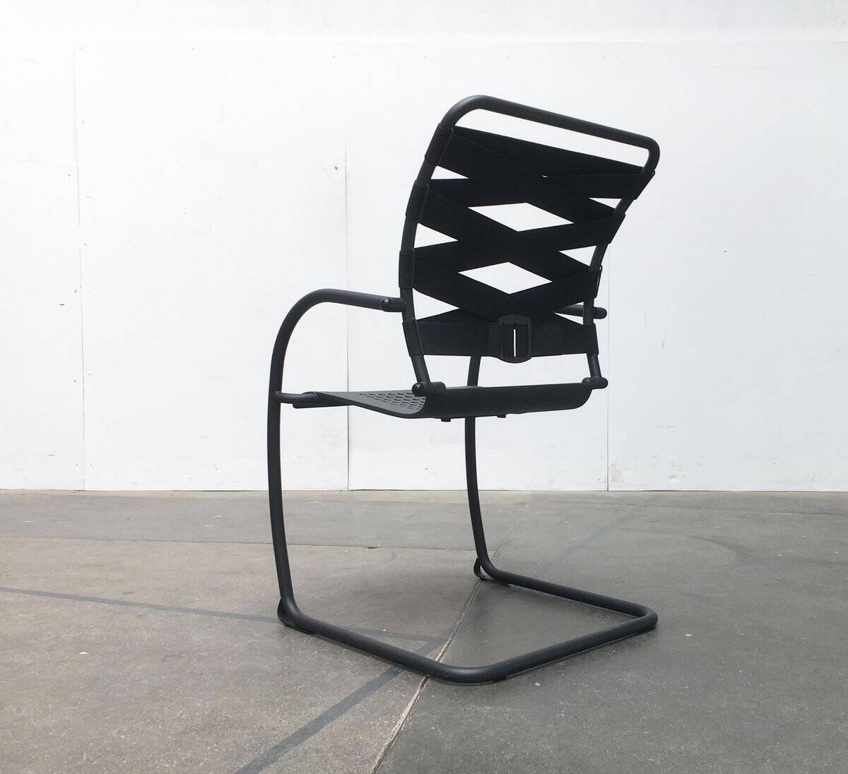 Set of vintage Italian postmodern cantilever armchairs Canasta by Heron Parigi for Heron Parigi Design.