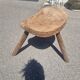 Old wooden tripod stool