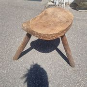 Old wooden tripod stool