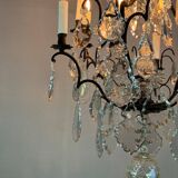 Black patinated bronze cage chandelier decorated with cut crystal pendants circa 1900