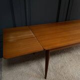 Scandinavian rectangular teak dining table with 4 tapered legs