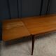 Scandinavian rectangular teak dining table with 4 tapered legs