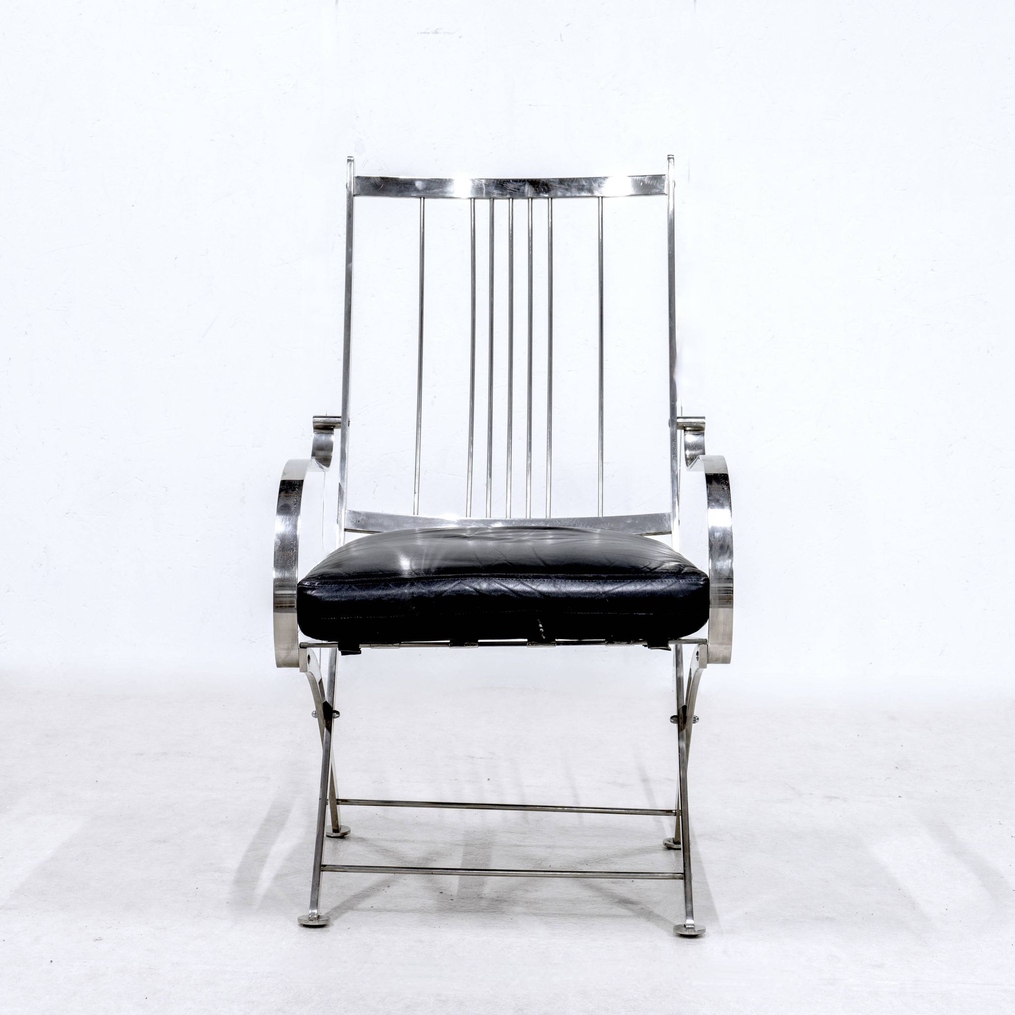 Henri Pouenat fauteuil et ottoman "Schneider "