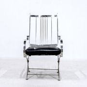 Henri Pouenat fauteuil et ottoman "Schneider "