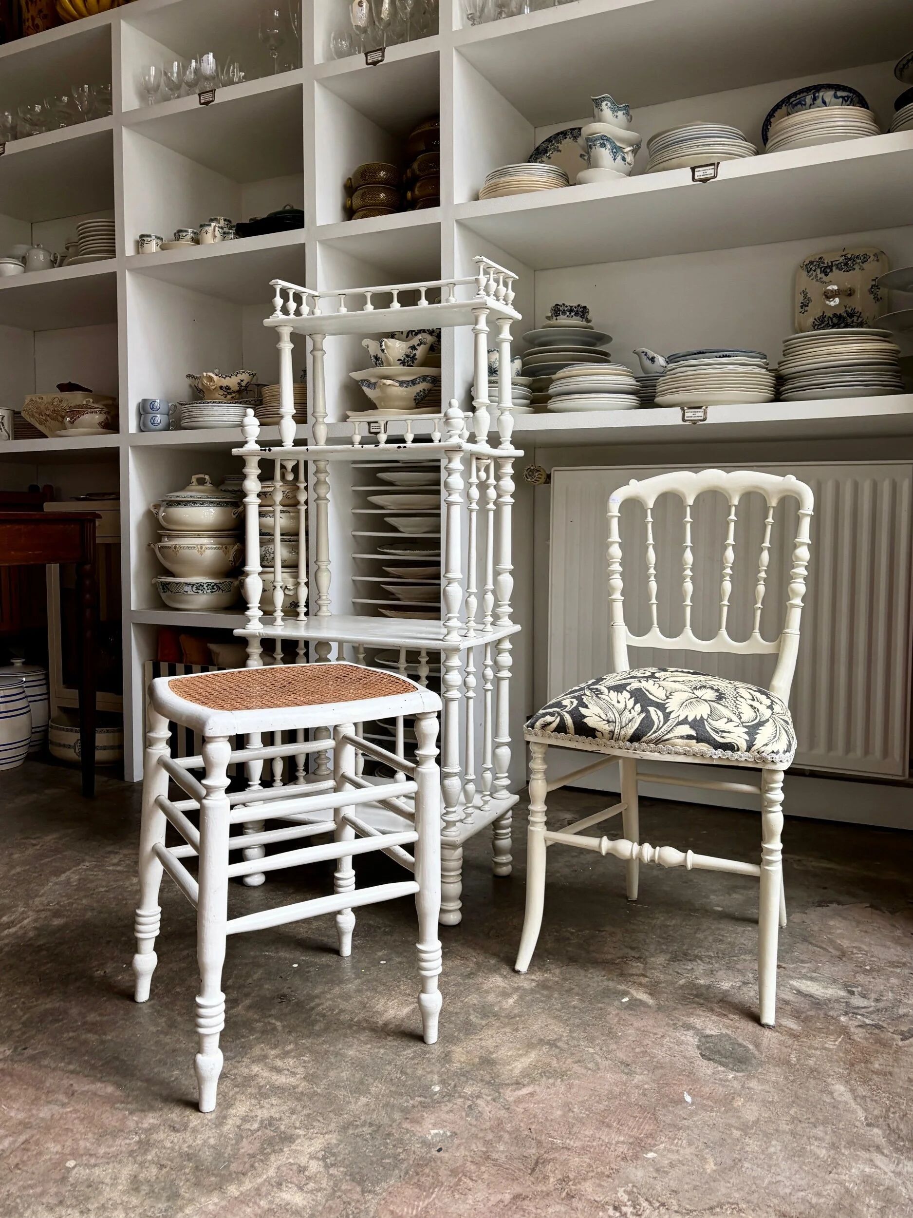 Library, white wooden sheet music cabinet.