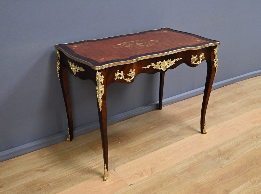 Rosewood, mahogany, and rosewood desk-table, Louis XV style – early 20th century.