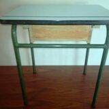 Child in formica desk