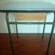 Child in formica desk