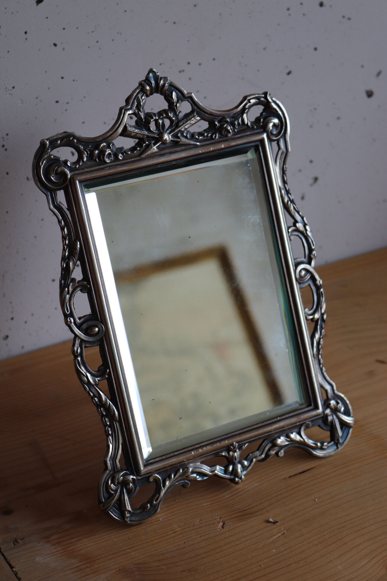 Small antique table mirror in Louis XVI style, silver-plated metal.