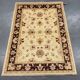 Tapis en laine crème et marron, style oriental traditionnel à motifs floraux, 106 x 150 cm