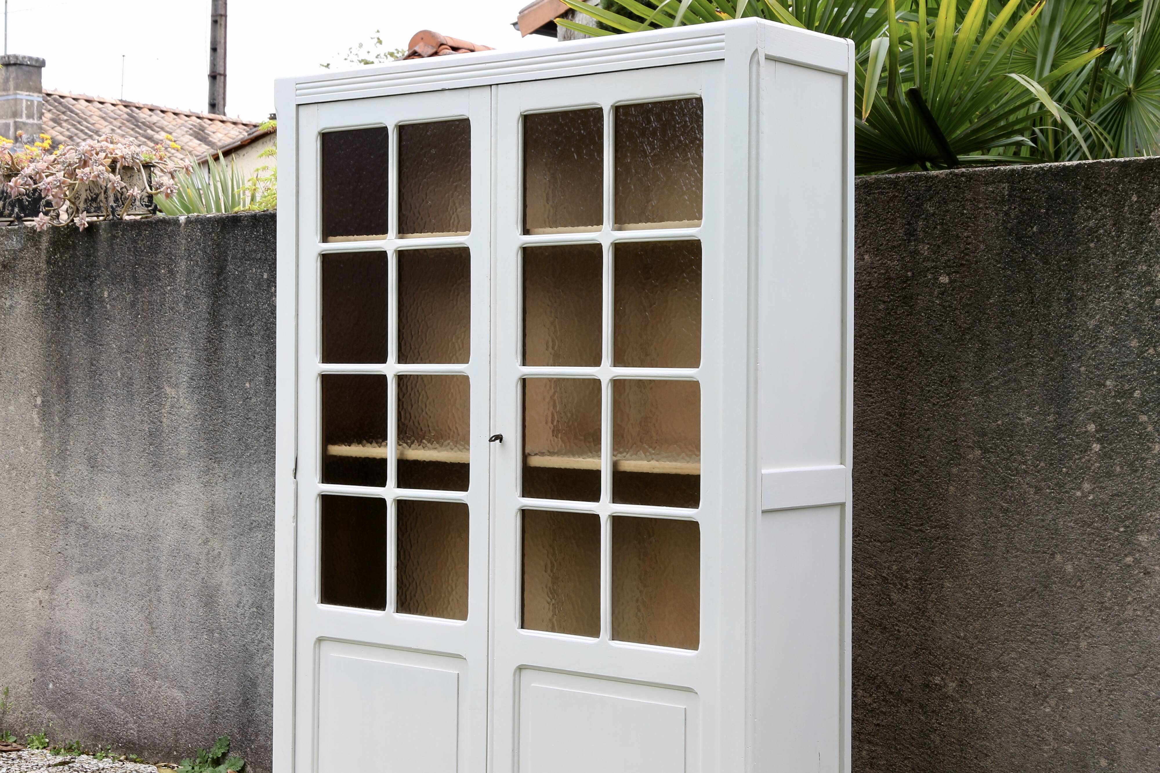 Vintage glass-fronted Parisian wardrobe
