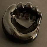 Black ceramic ashtray left hand
