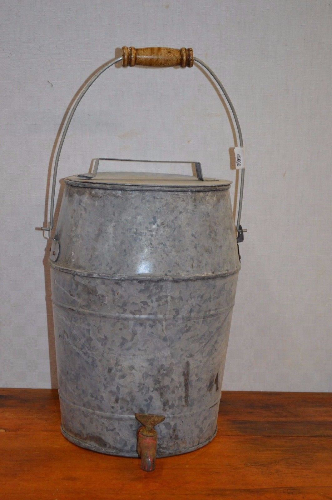 Zinc basin with a faucet